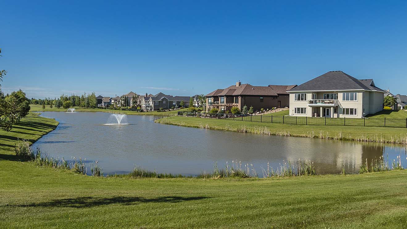 Pond-front homes in a residential subdivision