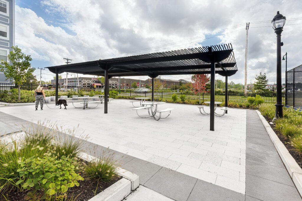 Plaza with shade structure and picnic tables