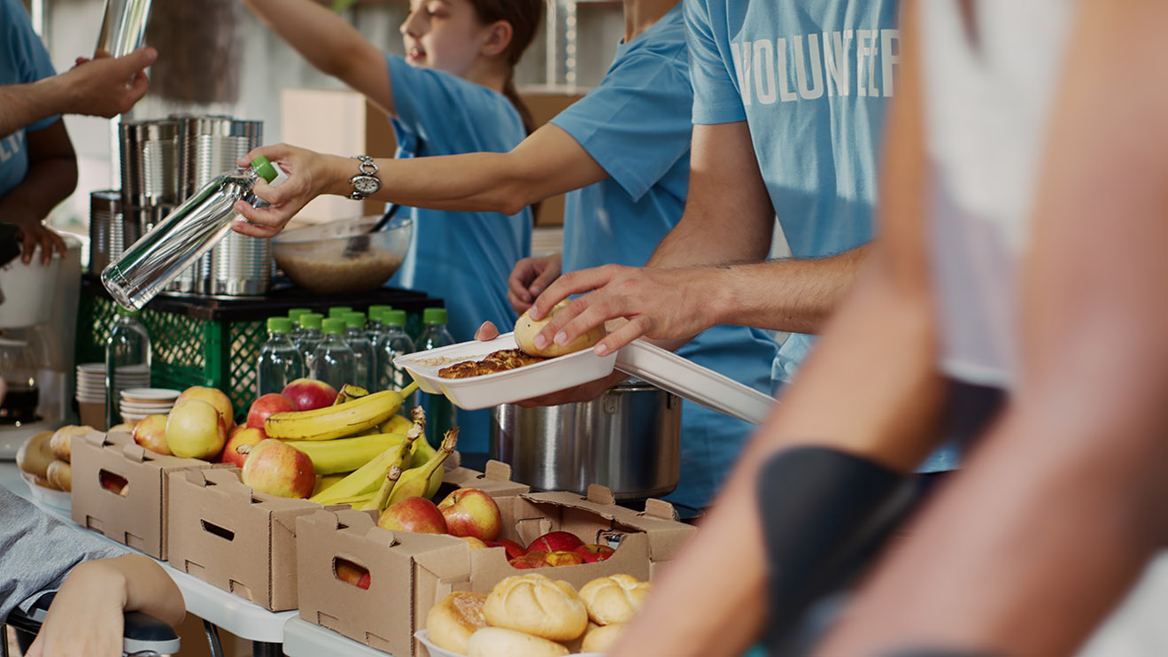 People volunteering at a food bank