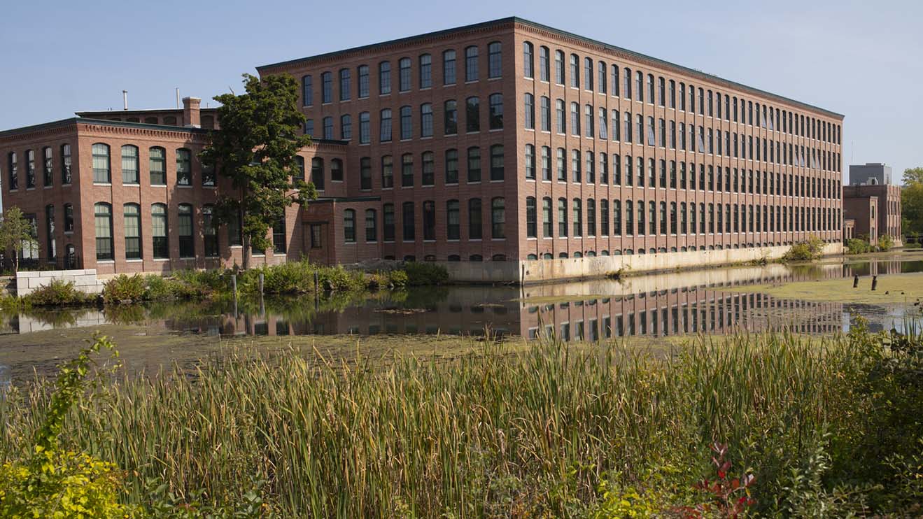 Adaptive reuse of a former factory into multifamily, waterfront