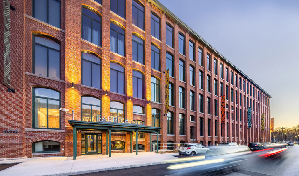 An exterior photo of the award-winning Fabrica Lofts multifamily adaptive reuse in MA