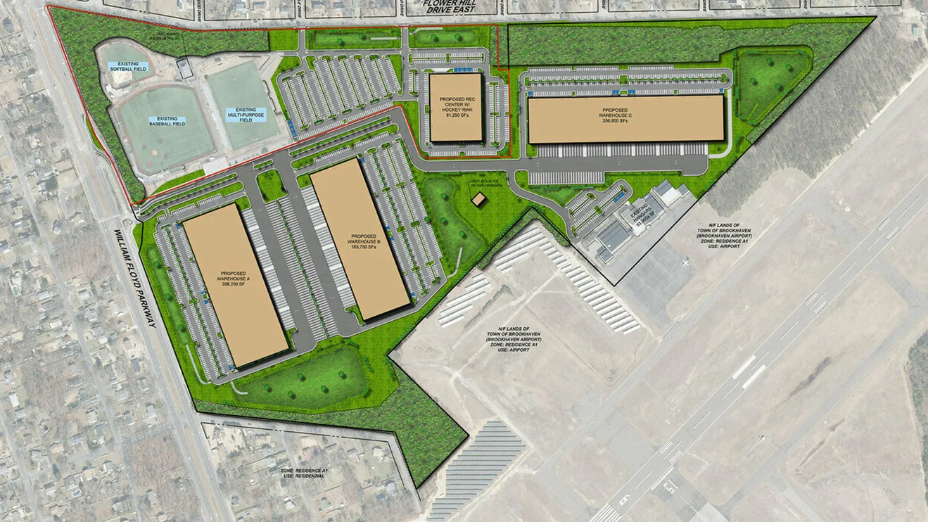 Site plan rendering of multiple industrial buildings and a hockey rink in NY