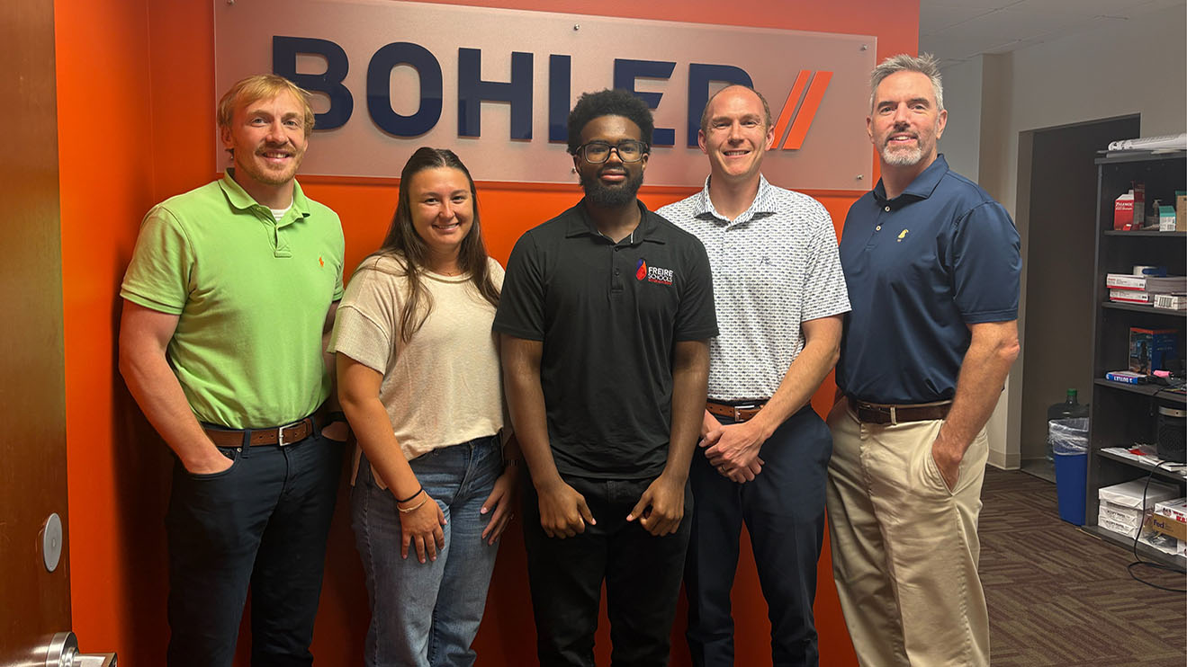 A group of Bohler employees with interns